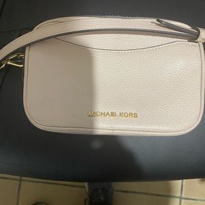 COPY - Small cross purse in preowned condition. No tear in very good condition.